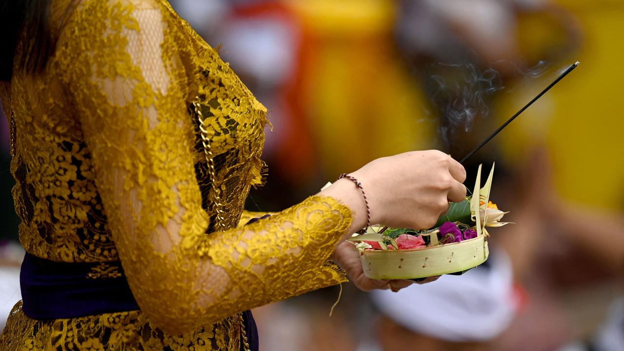 The offerings are very important to the Balinese. Picture: Sonny Tumelaka/AFP