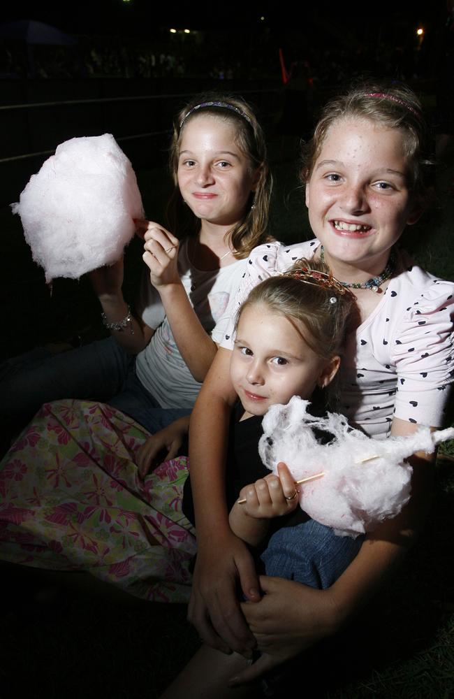 Tori, Katie, both 11, and Jessie-Leigh Grieger, 4, at the New Year’s Eve celebration at North Ipswich Reserve in 2011. Picture: Claudia Baxter