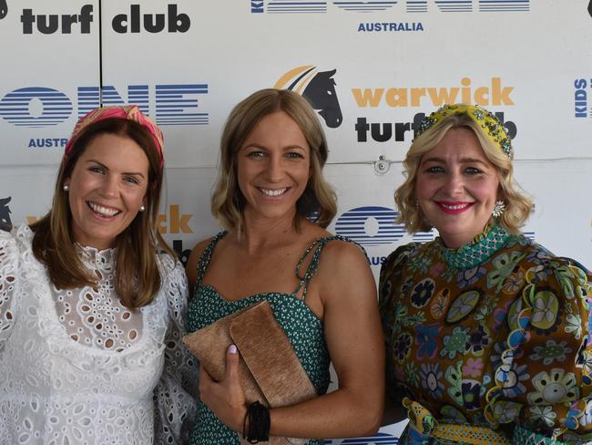 (From left) Mel Fitzpatrick, Anna Collins and Penny Doyle from Warwick at Warwick Cup race day at Allman Park Racecourse, Saturday, October 14, 2023. (Photo: Michael Hudson/ Warwick Daily News)