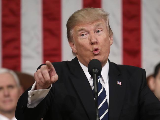 FILE - President Donald Trump addresses a joint session of Congress on Capitol Hill in Washington, Feb. 28, 2017. (Jim Lo Scalzo/Pool Image via AP, File)