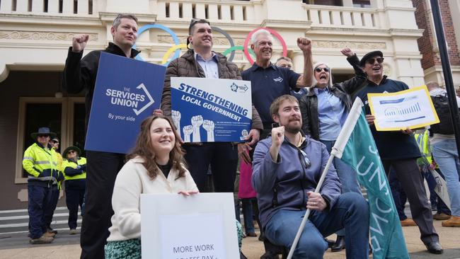 The Services Union members and Toowoomba Regional Council employees take part in strike action outside City Hall, July 25 2024. TSU secretary Neil Henderson leads a chant with staff.