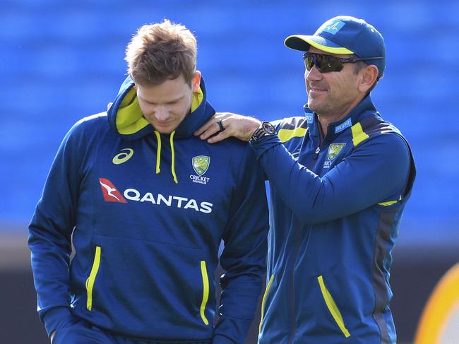 Australia coach Justin Langer, right, and Steve Smith during a nets session at Headingley, Leeds, England, Tuesday Aug. 20, 2019. England and Australia will begin the 3rd Ashes Test cricket match on Aug. 22. (Mike Egerton/PA via AP)