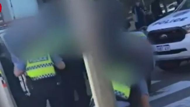 A police officer has allegedly been bitten in a wild assault outside a Perth shopping centre. Picture: 9NEWS.