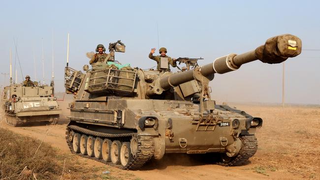 Israeli soldiers move in a convoy at an undisclosed location bordering the Gaza Strip on October 8, 2023. Hamas’ attack is also a strategic opportunity for Israel, the US and democracies everywhere. Picture: AFP