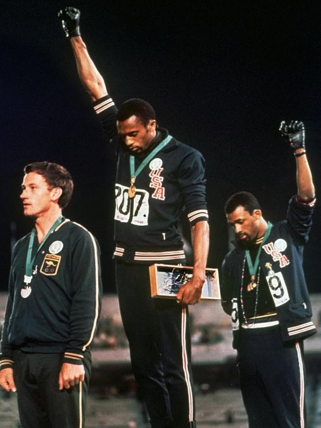 US athletes Tommie Smith and John Carlos’s controversial Olympics protest, with Peter Norman at left.