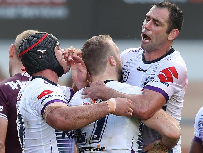 Melbourne's Cameron Smith celebrates a try scored by Melbourne's Tom Eisenhuth during the Manly Sea Eagles v Melbourne Storm NRL match at Lottoland, Brookvale. Picture: Brett Costello