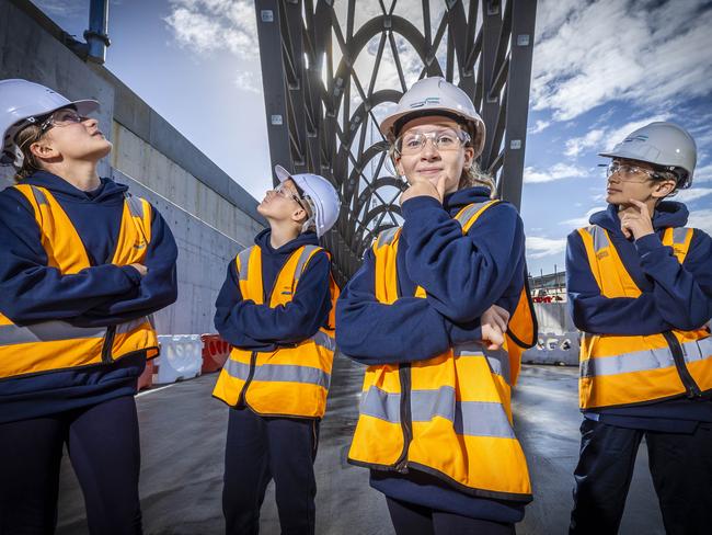 Footscray City Primary school students Isobel Bury (11), June Lee (10), Tilly McDowell (11) and Laeto Sandhu (11) think about what the new West Gate tunnel should be named. Picture: Jake Nowakowski