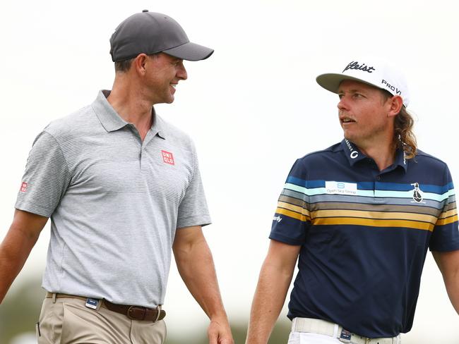 BRISBANE, AUSTRALIA - NOVEMBER 24: Adam Scott and Cameron Smith talk during Day 1 of the 2022 Australian PGA Championship at the Royal Queensland Golf Club on November 24, 2022 in Brisbane, Australia. (Photo by Chris Hyde/Getty Images)