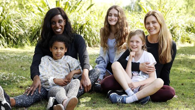 Deauvanné Jarvis with her daughter Charissa 6, and Shannon Ruddock with her daughters Maddie 11 and Abby 7. Picture: Tim Hunter.