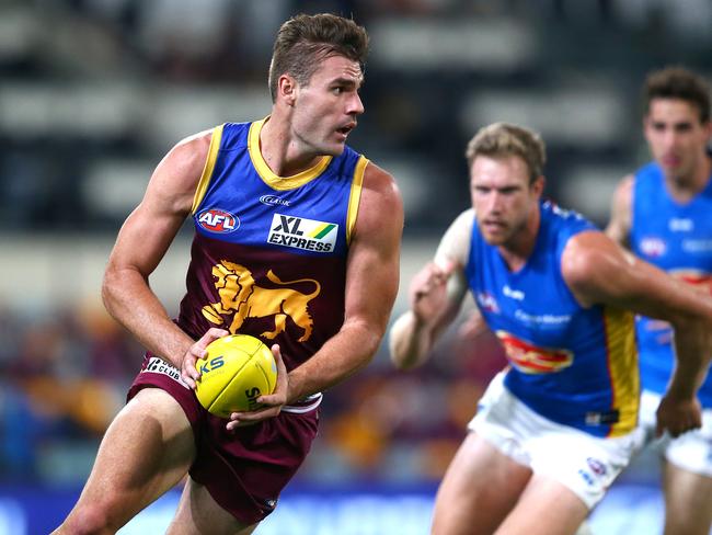 BRISBANE, AUSTRALIA - SEPTEMBER 09: Jack Payne of the Lions makes a run during the round 16 AFL match between the Brisbane Lions and the Gold Coast Suns at The Gabba on September 09, 2020 in Brisbane, Australia. (Photo by Jono Searle/AFL Photos/via Getty Images)