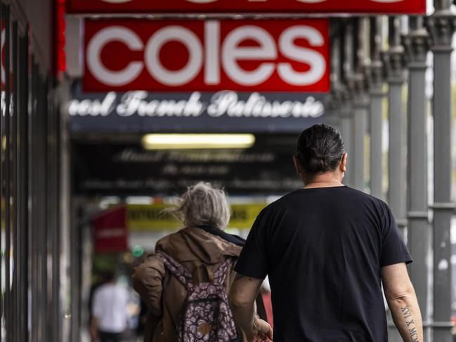 MELBOURNE, AUSTRALIA - NewsWire Photos October 15, 2021:  A person is seen carrying a Coles bag in Richmond, Melbourne, Victoria. Picture: NCA NewsWire / Daniel Pockett