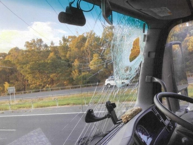 The rock left a gaping hole in the truck's window.