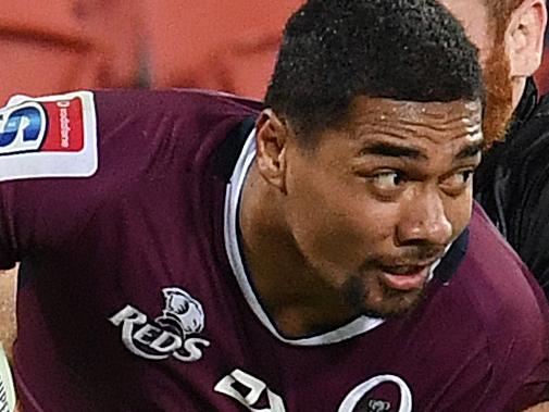 Chris Feauai-Sautia of the Reds (left) is tackled by Jamie Booth of the Sunwolves during the Round 12 Super Rugby match between the Queensland Reds and the Sunwolves at Suncorp Stadium in Brisbane, Friday, May 3, 2019. (AAP Image/Dan Peled) NO ARCHIVING