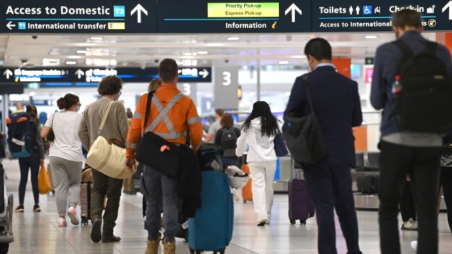 Premier Dominic Perrottet says he and Daniel Andrews want to work closely to reopen the interstate border as soon as possible. Travellers are seen at Sydney's Domestic Airport in May.  Picture: NCA NewsWire / Jeremy Piper