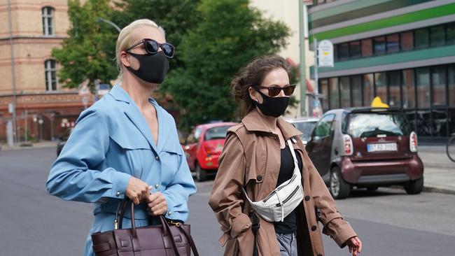 Yulia Navalnaya, left, arrives on Monday with a companion at Berlin’s Charite hospital, where her husband Alexei Navalny is been treated. Picture: Getty Images