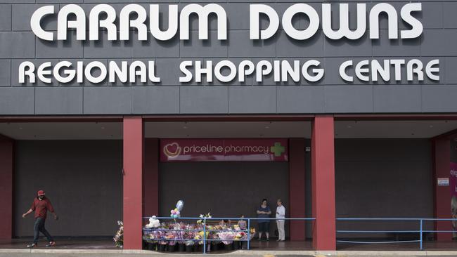 Flowers laid by members of the community at Carrum Downs Regional Shopping Centre where Andrea was struck by a monkey bike. Photo taken on the 26th of September, 2015. Picture: Christopher Chan