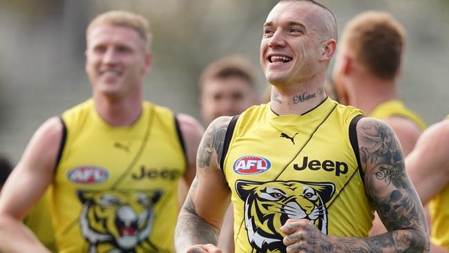 Dustin Martin has a laugh at Tigers training.