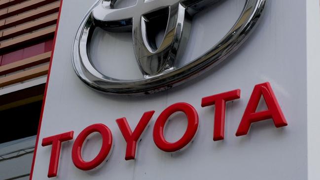 The logo of Japanâs Toyota Motor is displayed at a car showroom in Tokyo on August 4, 2022. (Photo by Kazuhiro NOGI / AFP)