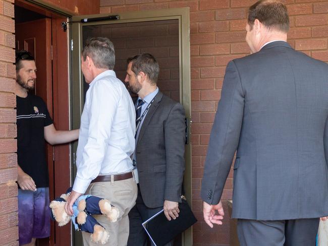 West Australian Premier Mark McGowan is greeted by Cleo’s stepfather during a visit to the rescued girl in Carnarvon. Picture: AAP