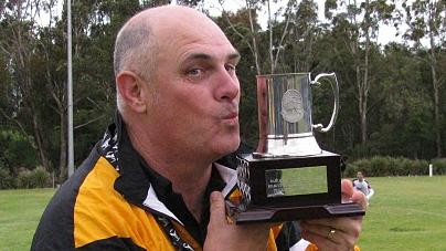 John Simmons (second from left) and coach Richard Baker (far right) from Pendle Hill Football Club. The 58 year old John Simmons will play his last game after 50 seasons on Saturday August 13.