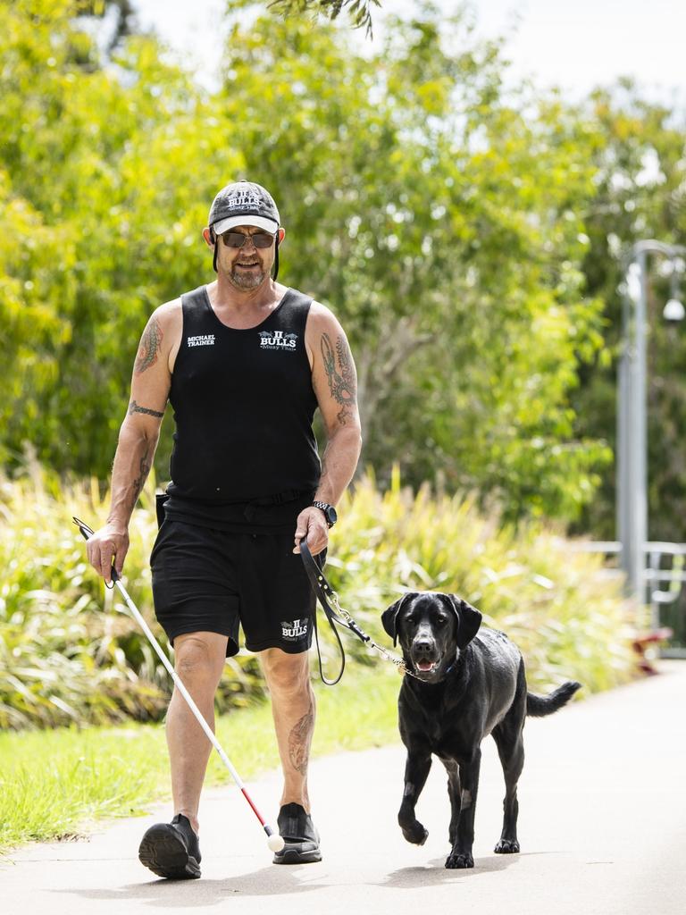 Michael Cooper with his new seeing eye dog Thea. Picture: Kevin Farmer