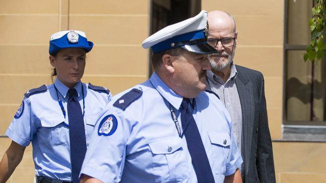 Convicted sex offender Darrel George Harington leaves the Supreme Court in Hobart.