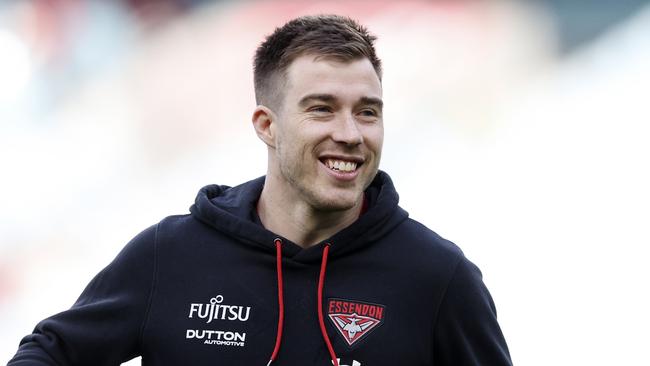 MELBOURNE, AUSTRALIA - AUGUST 04: Zach Merrett of the Bombers warms up during the round 21 AFL match between Essendon Bombers and Fremantle Dockers at Melbourne Cricket Ground, on August 04, 2024, in Melbourne, Australia. (Photo by Martin Keep/AFL Photos/via Getty Images)