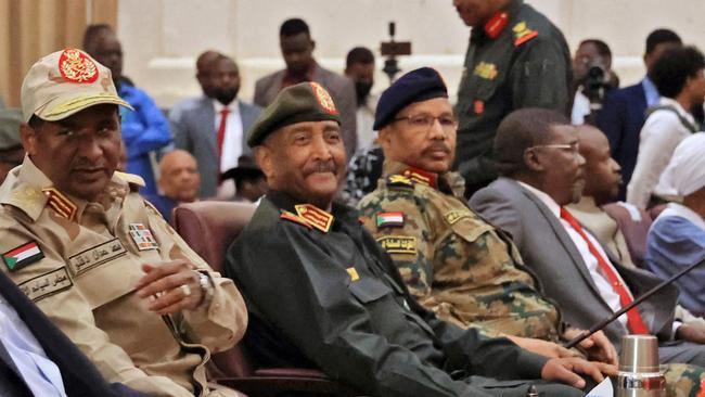 Sudan's Army chief Abdel Fattah al-Burhan (2nd-L), the face of military rule and paramilitary commander Mohamed Hamdan Daglo (L) are now locked in battle. Picture: AFP.