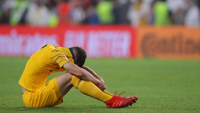 Milos Degenek of Australia looks dejected after the AFC Asian Cup quarter final match loss to United Arab Emirates. Picture: Getty Images