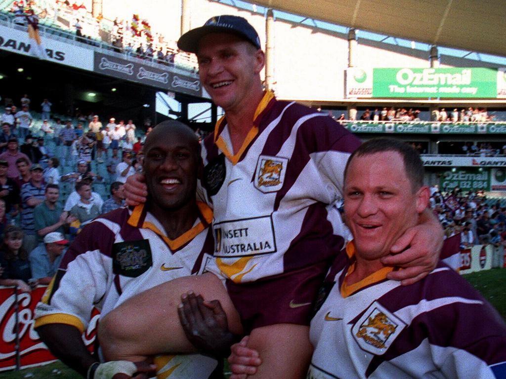 Brisbane Broncos captain Allan Langer along with Wendell Sailor and Kevin Walters after winning 1998 Grand Final.