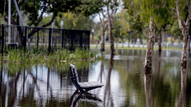 Floodwater due to heavy rain over the past few days is finally receding at Emerald Lakes, Carrara. Picture: Jerad Williams