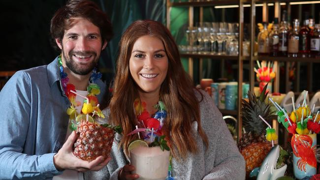 Maxime Vallee and Lisa Newton enjoy a summery cocktail at Hana. Picture: REBECCA MICHAEL