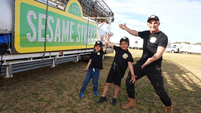 Sesame Street Circus Spectacular show director and Globe Rider Dominik Gasser with Mason and Cooper Gasser, next to the tent about to be put up at the Wentworth Showgrounds. Picture: Michael DiFabrizio