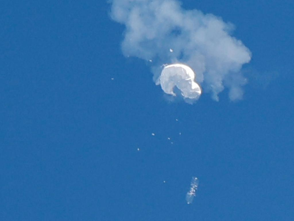 The suspected Chinese spy balloon drifts to the ocean after being shot down off the coast in Surfside Beach, South Carolina. Picture: REUTERS/Randall Hill