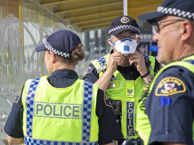 JQ707 arrives at Hobart from Melbourne, police prepare for arrival. Picture Chris Kidd