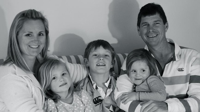 Julie Black with her pilot husband, David, with their children, Sophie, Oliver and Adelaide. Picture: Jane Dempster