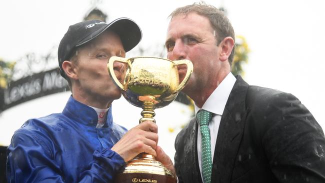 Cross Counter jockey Kerrin McEvoy and trainer Charlie Appleby celebrate with the Melbourne Cup.