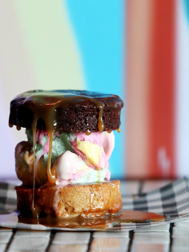 The rainbow ice cream sandwich drizzled with caramal sauce. Picture: Sue Graham