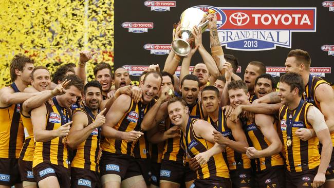 Hawthorn’s 2013 premiership team celebrate. Picture: Wayne Ludbey