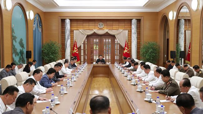 Kim Jong-un (C) attends a meeting of the Political Bureau of the Central Committee of the Workers' Party of Korea in Pyongyang. Picture: KNS via AFP.