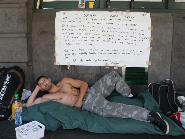 One of the men sleeping rough on Flinders St this week. Picture: David Crosling