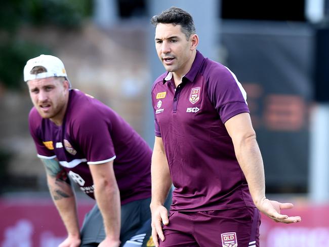 BRISBANE, AUSTRALIA - JULY 04: Former Queensland Origin fullback Billy Slater gives some advice to Cameron Munster during a Queensland Maroons State of Origin training session at Langlands Park on July 04, 2019 in Brisbane, Australia. (Photo by Bradley Kanaris/Getty Images)