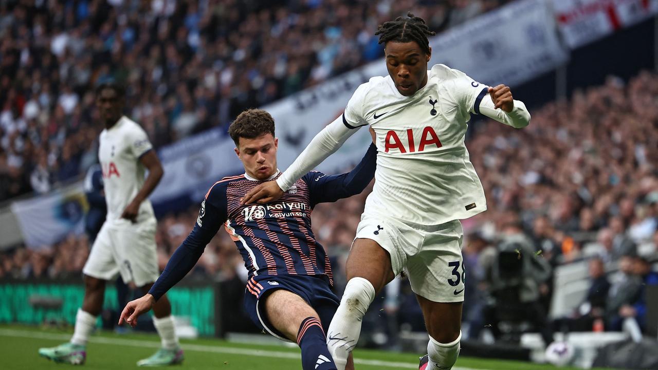 Tottenham Hotspur's Italian defender Destiny Udogie (right). (Photo by HENRY NICHOLLS / AFP)