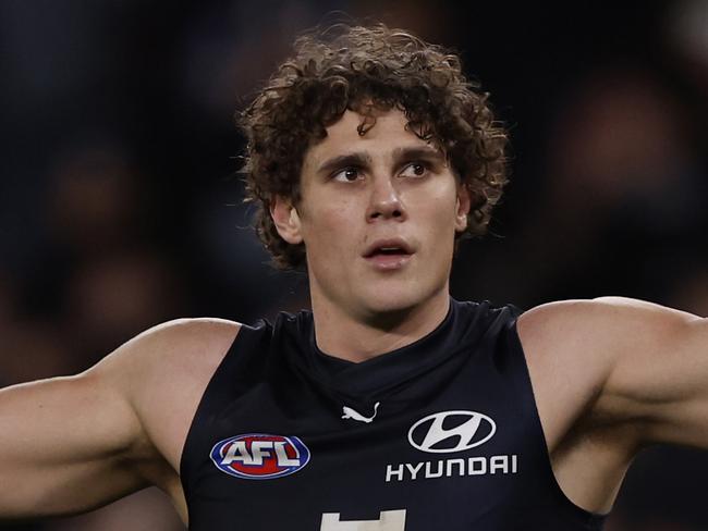 MELBOURNE, AUSTRALIA - JULY 21:  Charlie Curnow of the Blues celebrates a goal during the round 19 AFL match between Carlton Blues and North Melbourne Kangaroos at Marvel Stadium, on July 21, 2024, in Melbourne, Australia. (Photo by Darrian Traynor/Getty Images)