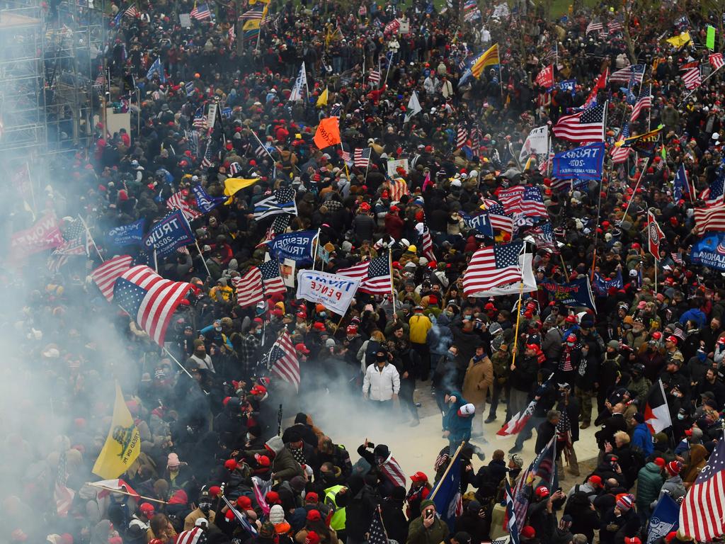 Trump supporters clash with police and security forces as they storm the US Capitol in Washington D.C. Picture: AFP