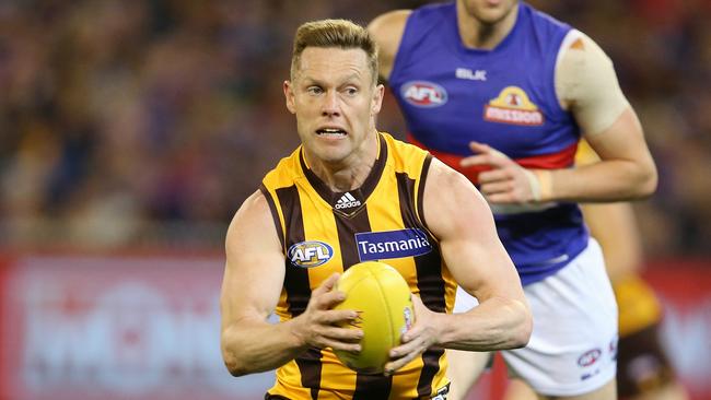 AFL. 2nd Semi Final. Hawthorn v Western Bulldogs at the MCG. Sam Mitchell gives Marcus Bontempelli the slip  . Pic: Michael Klein.