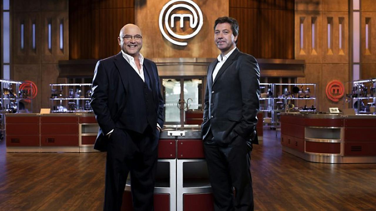 Gregg Wallace (L) and John Torode on the set of BBC reality TV show 'Masterchef UK'.