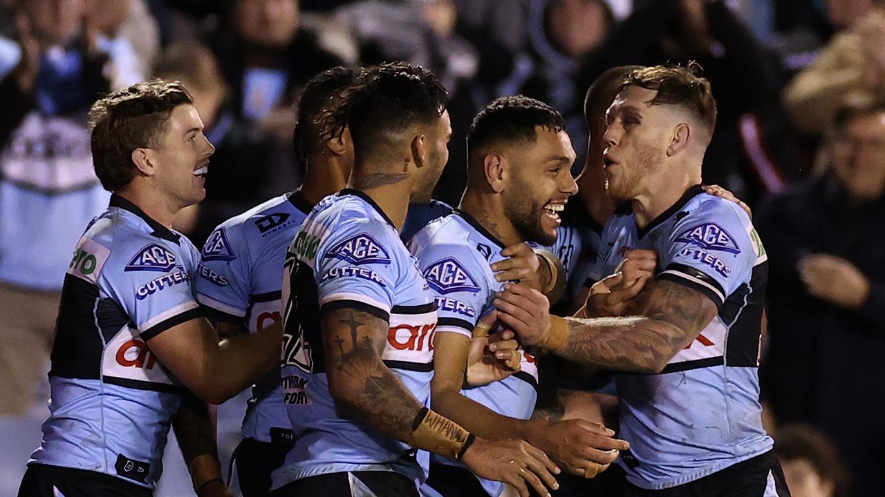 Jesse Ramien celebrates a try for the Sharks. (Photo by Cameron Spencer/Getty Images)