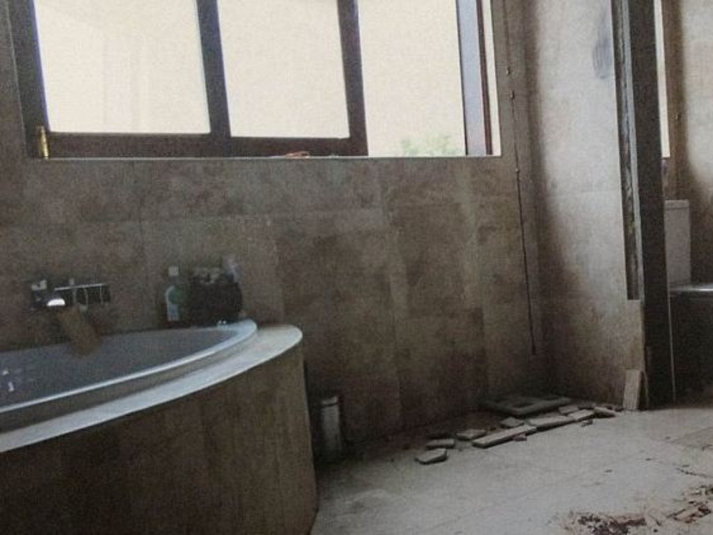 The grisly scene in the bathroom at Oscar Pistorius’ home, moments after he shot dead girlfriend Reeva Steenkamp. Picture: South African Police