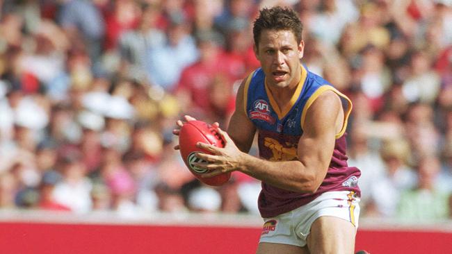 Chris Johnson on the burst for Brisbane Lions during his playing days. 